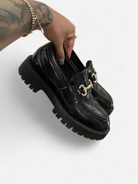 Steve Madden Black Patent Lug Sole Loafers with Gold Bit